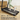 UREVO Foldi 3S Smart Treadmill: Woman running, highlighting double shock absorption and knee protection.
