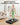UREVO SpaceWalk E1L walking pad in use, silent treadmill for home and office fitness, woman walking