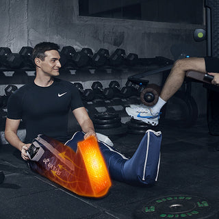  A man in a gym using a UREVO leg compression device.