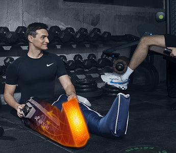  A man in a gym using a UREVO leg compression device.
