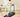 A woman running on a UREVO Strol 2S Pro Treadmill in a cozy home setting.