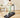 A woman running on a UREVO Strol 2S Pro Treadmill in a cozy home setting.