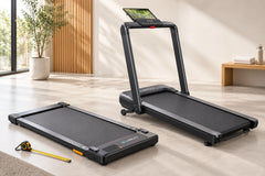Compact walking pad beside a full-size treadmill with a longer running belt