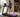 Athlete running on a smart treadmill in a modern home gym.