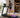 Athlete running on a smart treadmill in a modern home gym.