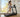 Woman jogs on a treadmill beside sunny home windows