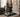 Woman walks on a walking pad in a home office.