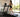 Fit woman running on a treadmill in a bright home gym