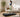 Woman walking on a walking pad in a bright modern living room at home