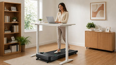 UREVO SpaceWalk 5L smart walking pad used under a standing desk in a modern home office