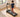 Beginner walking comfortably on a UREVO treadmill