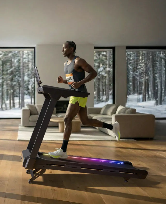 A man jogging on a modern treadmill inside a bright, stylish room.