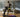 A man jogging on a modern treadmill inside a bright, stylish room.