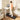 Woman works at standing desk while walking on UREVO SpaceWalk E1 Walking Pad