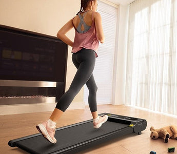 Woman Striding on Urevo Walking Pad at Home
