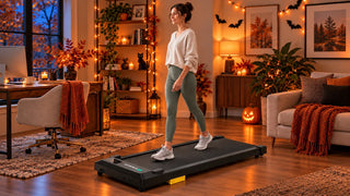 UREVO walking pad in a Halloween-themed home.
