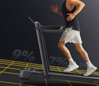 A Man Running on the UREVO Strol 1 Pro Treadmill