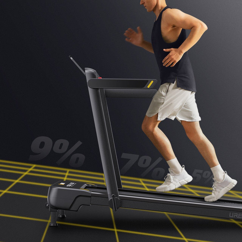 A Man Running on the UREVO Strol 1 Pro Treadmill