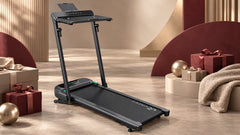 UREVO treadmill displayed with Black Friday gift boxes