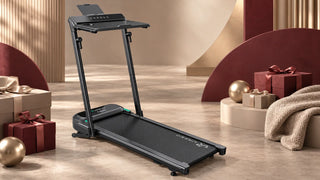 UREVO treadmill displayed with Black Friday gift boxes