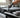 A person is repairing a treadmill