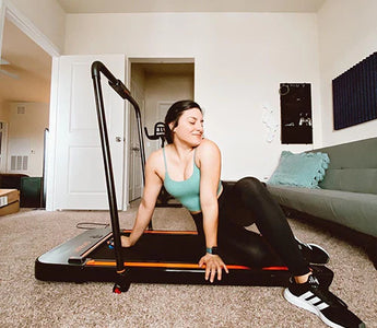 Happy and healthy woman using Urevo Treadmill Walking Pad