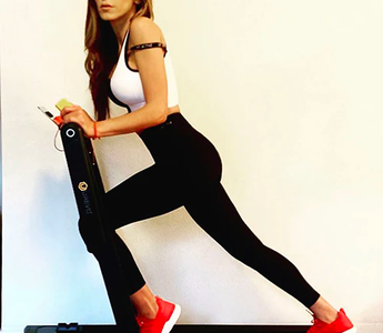 Fitness Enthusiast Training on Urevo Foldable Treadmills