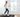 A woman works productively at her standing desk, staying active using the sleek UREVO SpaceWalk 2 Walking Pad at home