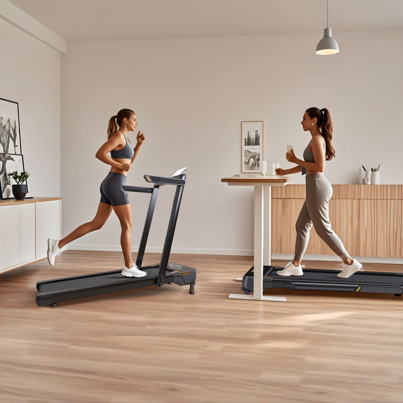 Two Women are practicing, one uses UREVO Strol 1 Pro Treadmill and another uses UREVO SpaceWalk E4W Smart Walking Pad