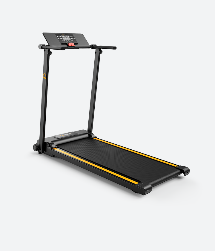 Fit woman posing with Urevo Foldable Treadmill