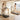 Two women using different treadmills in a home setting.