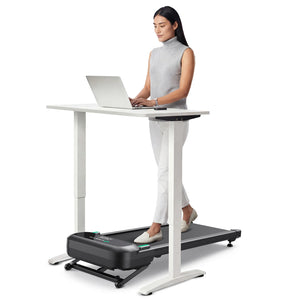 Woman using the UREVO SpaceWalk 5L Smart Walking Pad