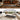 UREVO Spacewalk E4 treadmill with wood grain design, elegantly blending into your living space.