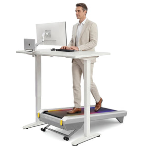 Man using the UREVO CyberPad office treadmill