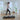 UREVO Spacewalk 2 Treadmill in a modern living room, with a woman walking on it.