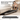 UREVO Strol U1 treadmill, space-saving design, easily stored under sofa. Dimensions 4.2" x 21.7" x 58.5"