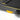 UREVO Strol 2E Smart Treadmill detail: Black running surface, yellow accents, and shock absorption components.