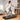 UREVO SpaceWalk 2 treadmill with woman walking indoors; showcasing home fitness solution.
